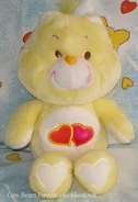 Love-a-Lot Bear's Belly Badge on Birthday Bear, considered a variant of I Love You Bear