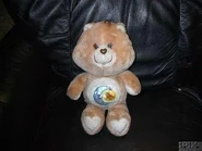 Bedtime Bear's belly badge on Tenderheart Bear