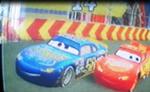 Medford and Lightning McQueen at the Palm Mile Speedway