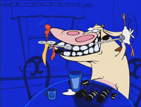 Cow appears eating sandwich cookies (also know as Oreo cookies). Then, she uses Chicken as floss, in which globs of the cookies fly across the screen. Cow gives a bright smile, with a dizzy-looking Chicken beside her.