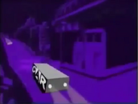 Parts from the Cartoon Network logo are shaped like a car is being chased by the police car. One of them gets hit by a bridge, then the police car falls to the river. The "Back to the Show" disclaimer does not appear at all. This bumper mainly used for action cartoons. In 2003, this bumper used the production music of Ed, Edd n Eddy (taken from the episode "One Size Fits Ed").