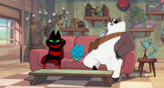 Trio sitting on the couch.