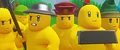 Six Bricktrons standing next to each other.