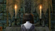 Tera praying at an altar in The Dracula X Chronicles.