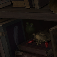 A frog-like figurine hidden in a bookshelf in "Walk Away".