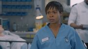 Louise on her first day of being a  at Holby.