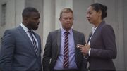 Jacob speaking with  and  outside the tribunal hall