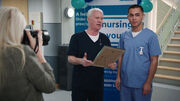 Charlie presents the bursary to Marty