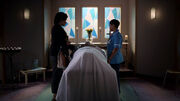 Louise bidding Ernest farewell with his daughter Lilley