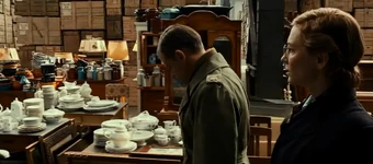 In Paris, Claire shows Granger a stock full of art stolen