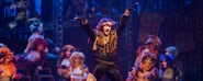 Rum Tum Tugger onstage Fulton 2025 01.png (1.62 MB) Tugger; behind, Bomba, Alonzo, Deme, Rumple, Skimble, Plato, Sillabub, Admetus