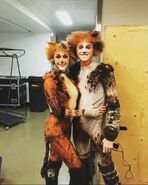 Natalie Bennyworth as Bombalurina and Nathan Zach Johnson as Admetus