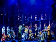 Fulton - Munk Linsdell - conducting - ensemble.jpg (1.54 MB) Munkustrap conducting - character IDs below in Details