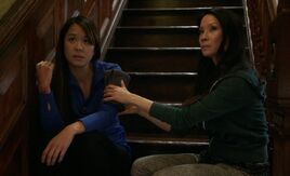 S04E19-Lin Wen Watson on stairs