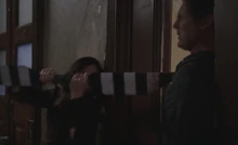 S06E20-Watson stabs Michael.jpg