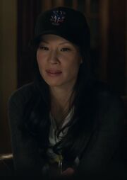 S01E01-Watson baseball hat