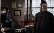 S01E09-In Trents office