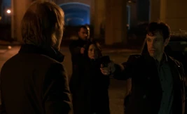 S02E22-Marchef gun at Mycroft