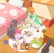 CCS CC ED1 - Sakura, Tomoyo and Kero playing cards