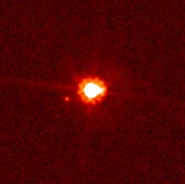 An image of Eris and its satellite taken in 2007 by the Hubble Space Telescope