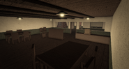 Eating area and cashier counter inside Amburgers.