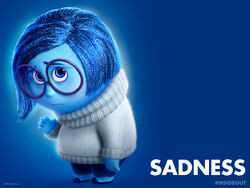 A promotional image of 'Sadness' from 'Inside Out' on a blue background