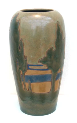 A vase by Rhead.  A similar vase broke the world record for American art pottery at the Rago Arts and Auction Center, March 10, 2007 when it sold for $516,000