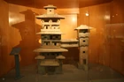 A Han Dynasty pottery tomb model of residential towers joined by a bridge