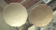 Chinese white ware dish (left), 9th century, found in Iran, and a  dish made in Iran (right), 12th century.