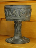 High-legged bucchero  with relief decoration, early 6th century BC (Louvre)