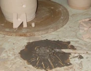 preparé una barbotina de la misma arcilla con un porcentaje de papel pasta de papel