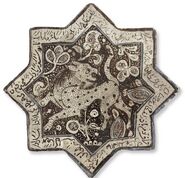 Kashan lustre-decorated star tile, Central Persia, circa 1300, Christie's sale 2835 Dec. 2009