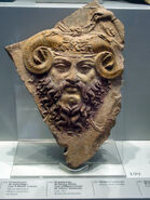 1st century Fragment with head of Jupiter Ammon, of unusually fine quality, reflecting Hellenistic style. Terracota con restos de la policromía original, Museo Barracco.