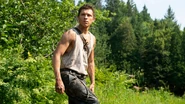 Promotional image of Todd Hewitt in a forest