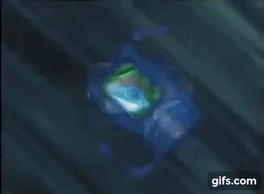 Mega Man (Star Force) transforming his Mega Arm into the Freeze Knuckle Battle Card.