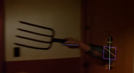 Jason breaks a door with a pitchfork
