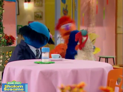 Brosh and Humongous Chicken interrupt Grover's waiter job while they're playing tag.