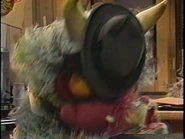 Flunky being swallowed up by Big Mean Carl.