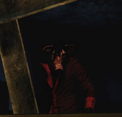 Pighead as he appears in Saw: The Video Game