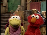 Bug with Elmo in the introduction interview for The Adventures of Elmo in Grouchland.