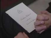 Located on the program to Prue's funeral. ("Charmed Again")
