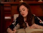 Paige writing in The Book