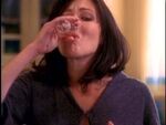 Prue drinks the cocktail