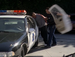 Darryl uses Super Strength on the car door.