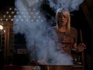 Billie brewing a potion for the To Make Lovers' Dreams Come True spell.