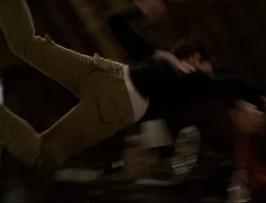 Phoebe flies across the attic as the Beast hits her, using Super Strength.