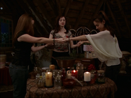 The Charmed Ones casting the spell.