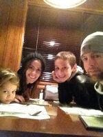 With his family at Dr. Hogly Wogly's Tyler Texas BBQ in California - November 28, 2011