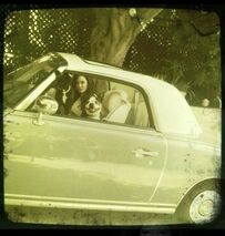 RoseTwitter.jpg (46 KB) With pups - Twitter, September 17, 2011