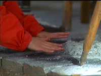 Phoebe Halliwell  tries to receive a premonition from a Scorch Mark